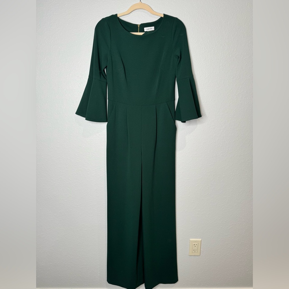 Green jumpsuit with pockets